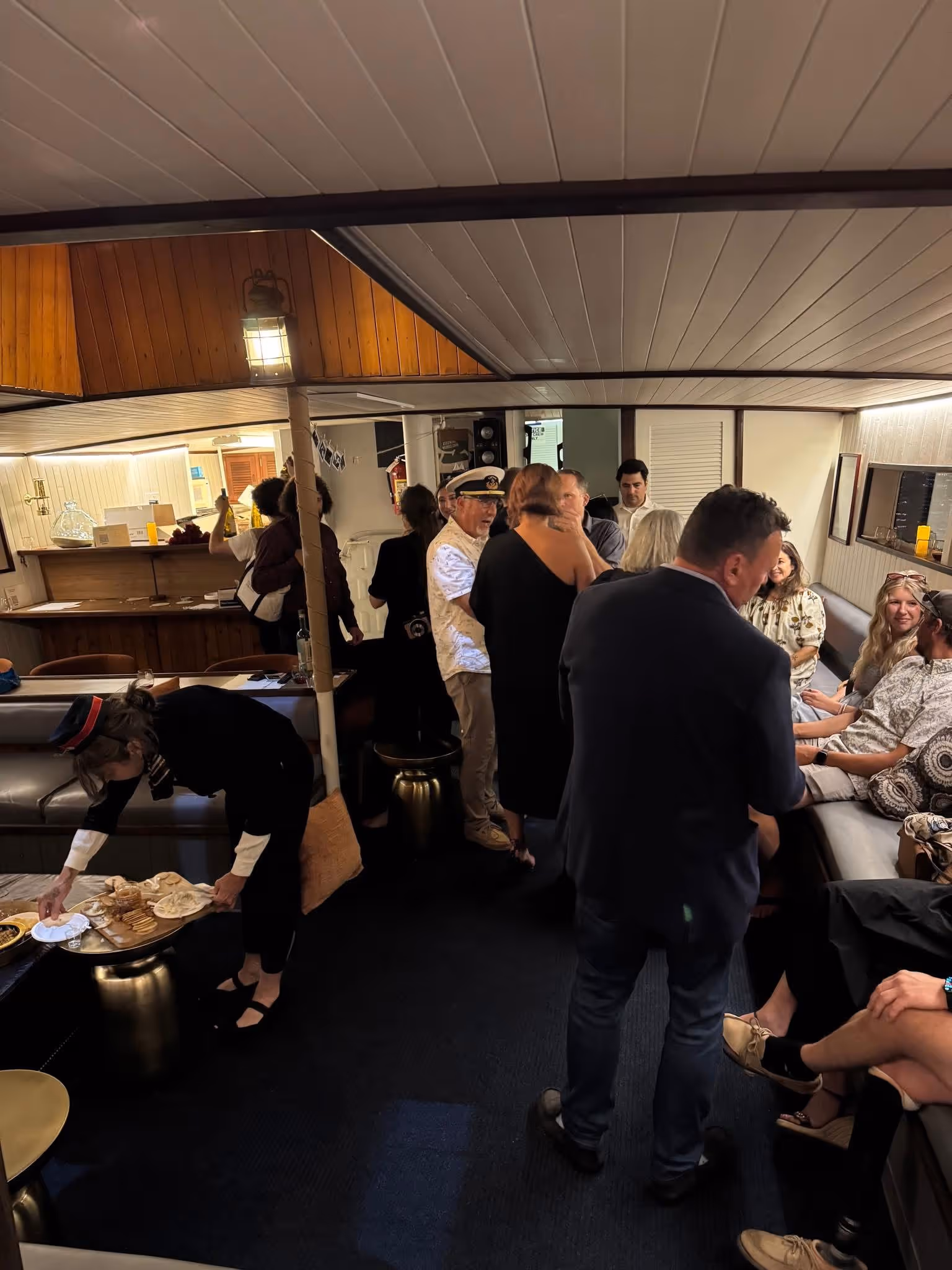 Schooner Rose private charter with large group inside the main salon